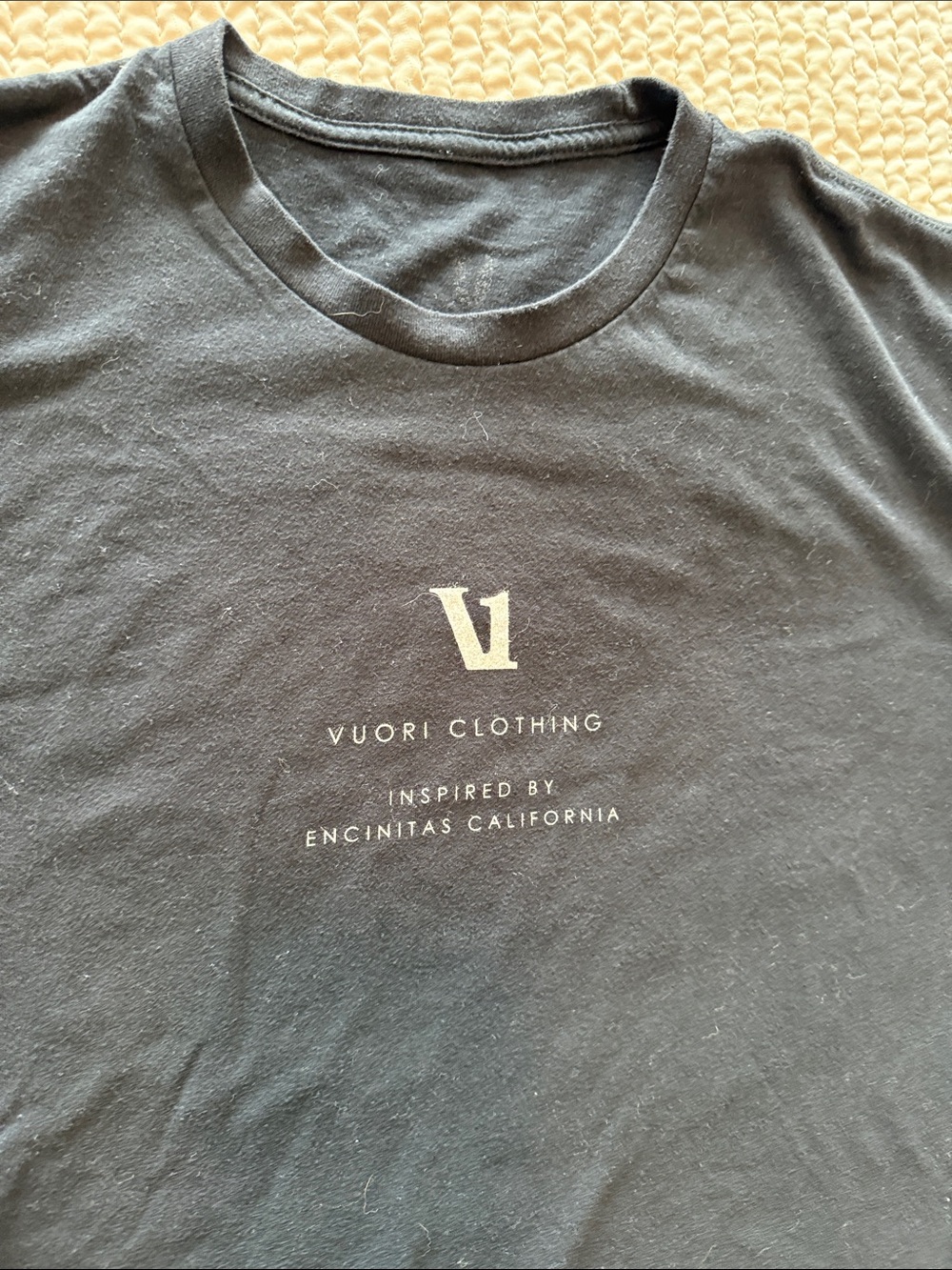 Vuori Black Short Sleeve Crewneck Tee with Light Logo Print